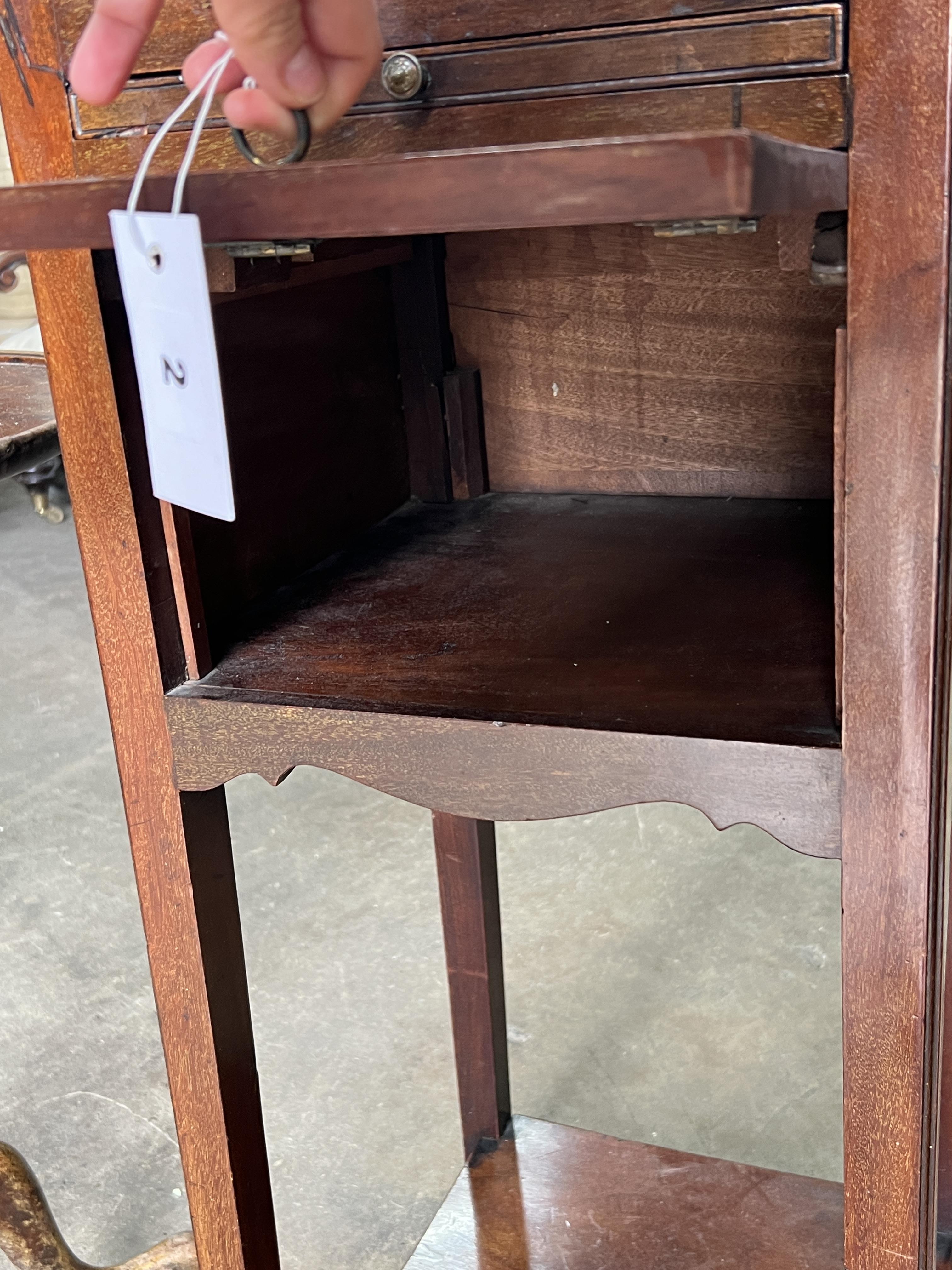 A George III mahogany tray top bedside cupboard, width 33cm, depth 33cm, height 81cm together with a 19th century circular tilt top wine table